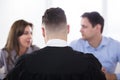 Couple Quarreling In Front Of Judge Royalty Free Stock Photo