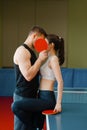 Couple with rackets kissing at the ping pong table Royalty Free Stock Photo