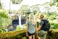A couple at The Rainbow Falls, Hilo, Wailuku River State Park, Big Island, Hawaii Royalty Free Stock Photo