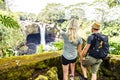 A couple at The Rainbow Falls, Hilo, Wailuku River State Park, Big Island, Hawaii Royalty Free Stock Photo