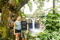 A couple at The Rainbow Falls, Hilo, Wailuku River State Park, Big Island, Hawaii Royalty Free Stock Photo