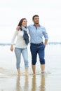 couple on rainly day at tropical beach Royalty Free Stock Photo
