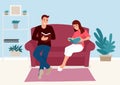 Couple reading book together on the sofa at home