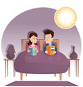 Couple reading books in bed