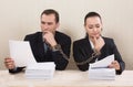 Couple reading a contract Royalty Free Stock Photo