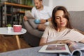 Couple reading and drinking coffee in the morning Royalty Free Stock Photo