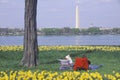 Couple reading in Lady Bird Park, the Potomac River, Washington, D.C.