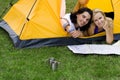 Couple Reading Map in Tent Royalty Free Stock Photo