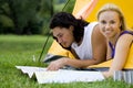 Couple Reading Map in Tent Royalty Free Stock Photo