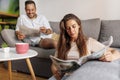 Couple reading newspaper and drinking coffee Royalty Free Stock Photo