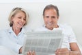 Couple reading newspaper Royalty Free Stock Photo