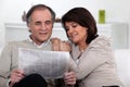 Couple reading the newspaper Royalty Free Stock Photo