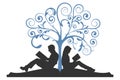 Couple Reading Under Tree