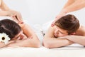 Couple receiving back massage Royalty Free Stock Photo