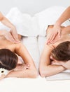 Couple receiving back massage Royalty Free Stock Photo