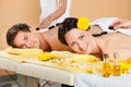 Couple Receiving hot stone Therapy At Spa Royalty Free Stock Photo