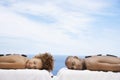 Couple Receiving Hot Stone Therapy At Spa Royalty Free Stock Photo