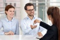 Couple receiving keys to their first home from female agent Royalty Free Stock Photo