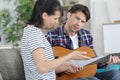 couple recording music video blog home lesson Royalty Free Stock Photo