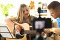 Couple Recording Music Video Blog Home Lesson Royalty Free Stock Photo