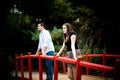 Couple on a Red Bridge Royalty Free Stock Photo