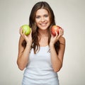 Couple of red and green apple smiling woman holding Royalty Free Stock Photo