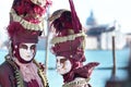 Couple of red masks at the Carnival of Venice