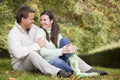 Couple relaxing in autumn woods