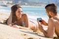 Couple relaxing on beach Royalty Free Stock Photo