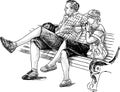 Couple relaxing on a bench