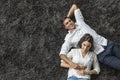 Couple relaxing on the carpet