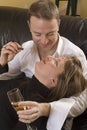 Couple relaxing on couch Royalty Free Stock Photo