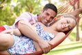Couple Relaxing In Hammock Royalty Free Stock Photo