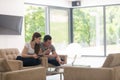 Couple relaxing at home with tablet and laptop computers Royalty Free Stock Photo