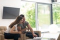 Couple relaxing at home with tablet and laptop computers Royalty Free Stock Photo