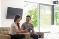 Couple relaxing at home with tablet and laptop computers Royalty Free Stock Photo