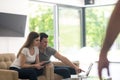 Couple relaxing at home with tablet and laptop computers Royalty Free Stock Photo