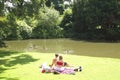 Couple relaxing at lakeside