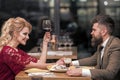 Couple relaxing in luxury restaurant. Concept about love, relationship and travel. Dating people. Royalty Free Stock Photo