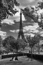 Couple relaxing near the Eiffel Tower in Paris