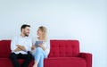 Couple relaxing on a sofa and using tablet at home together,Happy and smiling,Free time Royalty Free Stock Photo