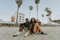 Couple relaxing at Venice Beach Royalty Free Stock Photo