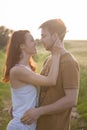 Couple relaxing on wheat field Royalty Free Stock Photo