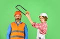 Couple is renovating home. couple doing apartment repair together themselves. man and woman wear safety helmet. couple Royalty Free Stock Photo