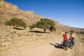 A couple resting during a cyclist tour in Morocco