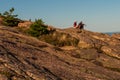 A Couple Rests On Cadillac Mountain