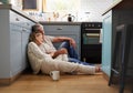 Couple, retirement and kitchen on floor in home together, romance and love in house. Smile, memory and people remember Royalty Free Stock Photo