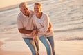 Couple, retirement and travel to the beach, hug and love, fun together and spending quality time outdoor by the ocean Royalty Free Stock Photo