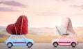 Couple of retro toy cars with Valentine hearts Royalty Free Stock Photo