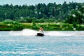 Couple ride a jet ski in summer Royalty Free Stock Photo
